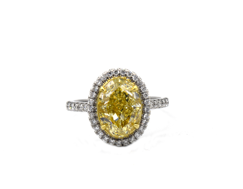 Oval Yellow Diamond Halo Ring 3 carat Two Tone 18K Gold setting