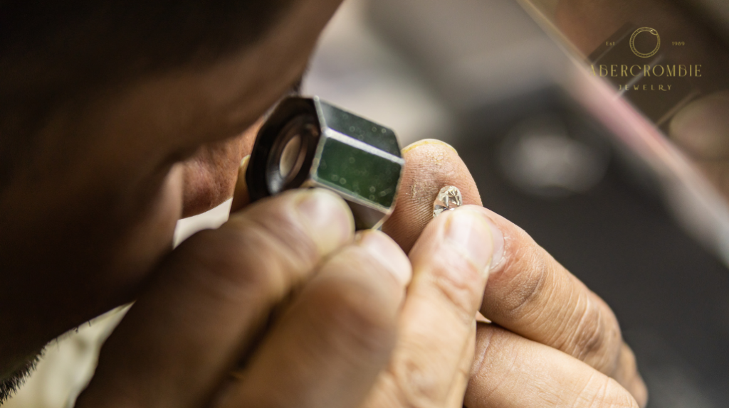 jeweler inspecting diamond