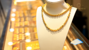 gold plated necklace in necklace mannequin