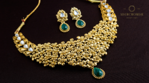 gold plated bib necklace and earrings 