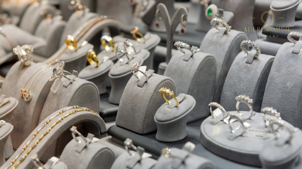 assorted silver and gold plated rings on display