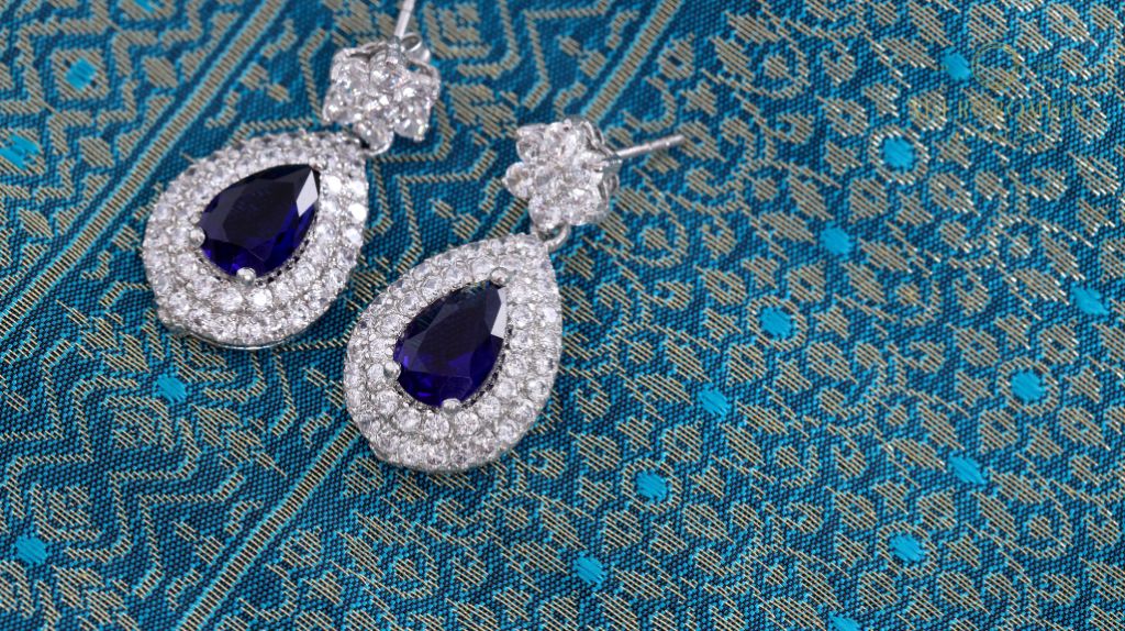 silver earrings with diamond and sapphire stones